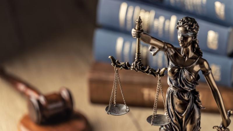 stock image of some scales to signify legal system